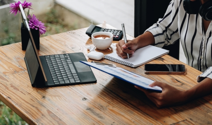 shot of female bookkeeping expert using tablet Outsourced Bookkeeping for Nonprofits